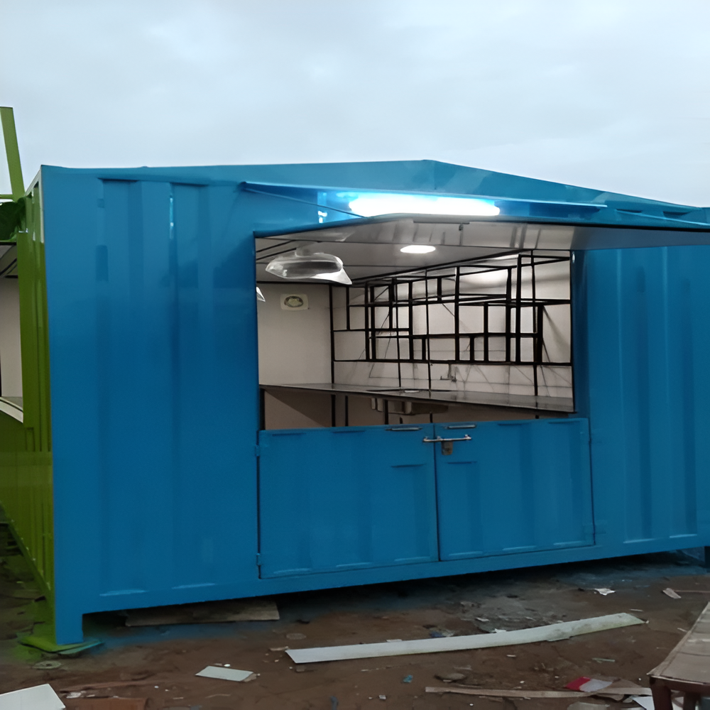 Portable container retail shop cabin with open serving counter and interior shelving
